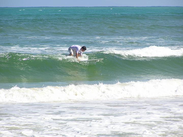 p1015590.jpg - The waves never were really big enough to get a good ride but Doug gave it his best!