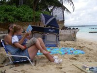 imgp1435  Story time then a nap on the beach. We'd just had plate lunch at Keneke's in Waimanalo. SOOOO good!