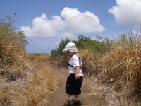 IMGP2647  Little buddy showing me the way down. Could the sky be any prettier? We have been talking about the word "rustle" and what it means. The grasses blowing in the breeze provided good opportunity to hear a rustle. We also saw an old volcano (Koko Head) so we talked about that for a while, too. He loves to learn.