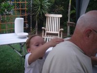 IMGP3707  Sammy liked the idea of putting ice down Grandpa's back...bad mommy for putting him up to mischief!