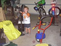 IMGP3755  Sam pumping up his bike tires :)