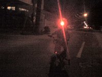 ATT01131  Mountain biking with mommy on Wednesday nights while Dave is in class. Sam got to wear my cool headlamp! I love that it has a red nightvision setting...oh the mischief one can get into with a nightvision headlamp...