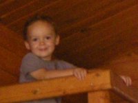 imgp4199  Sammy in a bunkbed in the log cabin we rented for a day :) I got a little stir-crazy waiting for a space-a flight to WA so I just took off with clean underwear for both of us, snacks, water and headed to Bellows. We rented this little log cabin for $35 not knowing if we were staying the night or not. I figure it cost as much as a pedicure, which would have satisfied most women, so no big deal if we didn't end up staying.