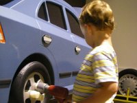 imgp4241  Fixing cars.