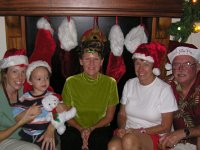 2007-12-18CarolingHawaiiStyle (5)  In the middle is a friend of a friend - Vicki. She lived on the east coast for a bit so we enjoyed talking about how we miss snow.