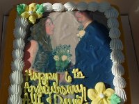 P1010009  Mom's nice cake for our anniversary :) This is us on 12/31/01.