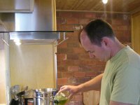 imgp5855  Dave in the new kitchen making Christmas Eve pasta dinner. Should I include a picture of the kitchen as it was before??? I think so...