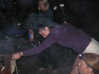 2008-01-26Sam3B-dayCamp (2)  Now it's time to make some s'mores! Angel and Mike came with their son David and his friend Nick to celebrate. That's Angel in the background and Dana getting all pyro with her lighter fluid :)