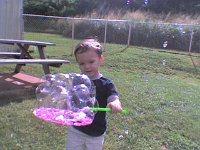 ATT00708  At Learn with Me! He loves to catch big bubbles!