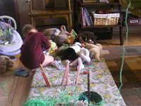 imgp7479  This was fun - Sam loves to throw a party, and I had some work to do in that guest room (remember the extreme nesting?). So I set him up with his "friends" and some other paraphernalia. He threw a birthday party for puppy, who was turning 5.