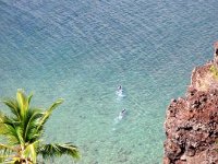 PC060084  Snorkelers 200 feet below.