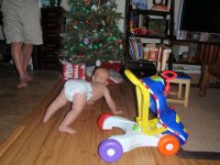 PC200032  Ben is up on all fours! Stong boy. He's pulling up to a stand as well. Walking soon!