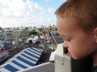 P8160014  Sam checking out the ride options from a bird's eye view.