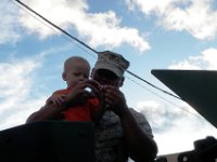 P8160065  Learning to shaka atop the turret of the humvee. This Marine was so awesome about showing the boys around.