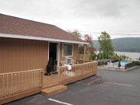 P9230241  An example of one of the cagins with its own little deck. This is #209 I believe, in case I ever find this picture again for reference! It's the Sundowner Motel in Lake George.