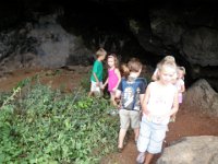PA120023  Checking out a cave on the hike up to the WWII bunker.