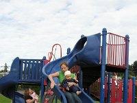 9-21-2005SwingInPark  Sept 2005 - Sam is 9 months old in this picture, going down the slide at the Lions Park in Poulsbo. Thanks for sending, mom!