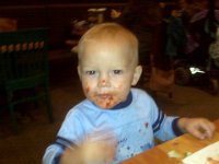 IMG00054  Out at dinner with John, Christine, Austin and Mallory at Silver City Brewing Company in Silverdale WA. So great to see them again! John will never be the same again after seeing Ben go after ketchup like this.