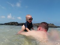 Copy of PA100039  Ben romping with Daddy. He really loves rough play with Daddy and regularly wades or swims into water that is too deep for him. Constant watchfulness!