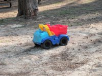 P1220023  This little dumptruck serves many purposes. It hauls camp toys, bugs, chalk, cars...