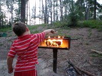 P1220046  Making s'mores! Look at how grown up Sam is - he is a roasting pro now. SO many things change from year to year. I remember his first campout here in Hawaii when he was just turning 2.
