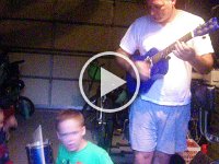 IMGP0575  The garage band - Sam and Ben playing drums with Daddy on guitar :)