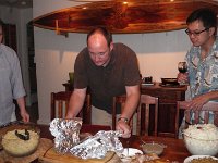 IMGP1891  Dave carving up the roast under the watchful eyes of Doug and Joseph.