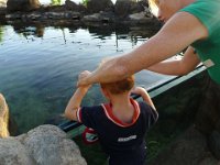 2011-03-28MarineMunchiesWaikikiAquarium (34)  Outside feeding more fish with tweezers!