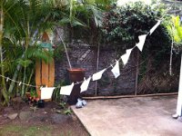 clothesline art  Sam really wanted clothespins from the market, so Gramma bought them. He went out and created this art project - on each page is part of "One, two, buckle my shoe | Three, four, close the door...".