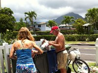 Harrison1  Here is another unique and wonderful character - Harrison. He is a Kailua fixture, riding around Kailua picking up recyclables to supplement his income. He puts out my green and blue bins on the right days, keeping me straight. Funny how mom caught us both going through the trash!