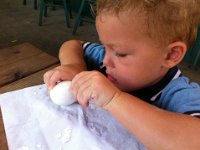 photo 3  Peeling his own egg now.