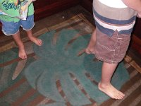 IMGP3988  We are shoeless, though, in a nice hotel. All three of us. Carrying all our bags up to our room. Slipperless like gypsies. We wandered the streets of Waikiki the next day looking for slippers. Sam and I finally found some, but it was harder to find some for Ben.