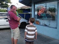 IMGP3993  Then when Dave finally got back to the hotel from work, we fought traffic over to Kailua to wrap up the house, check on house cleaning (best $250 spent yet) and have dinner. I have wanted to go here for YEARS. Finally, we went. The food was beyond great and the history of the place is what did it for me. It's been in business since the '60s. Claudio, the owner's son, told me that it is a bit of a secret because so many celebrities have come through there, including John Wayne, Jerry Garcia, Tom Selleck. Those are the names I remember. The spaghetti sauce has been in his mother's family since 1690 (!) and the sausage recipe has been in the family since the 1500s. Wow! Love love love this place. You bring your own beer or wine. It is humble inside. Just the way I like it. See the sign isn't even lit all the way up?