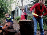 IMGP5493  A little more wood for the fire. The boys come running out when they hear me pounding. They all have safety glasses (not on quite yet here) and Ben is using Sam's new sledgehammer.