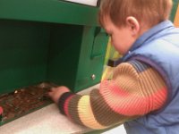 IMAG1259  Ben helping me count the change for Pennies for Peace. We raised $12.18!