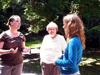 photo 13  This is my friend Ben's wife and her mom - finally got to meet them! They adopted a couple of our hens including Oli Ednamode. And also hatched some fertilized eggs we donated when their hens went broody. I offered a cookie and lemonade to the mom and when she went to do hand sanitizer, my bottle went nuts on her and shot out a huge bolus right into the crotch area of her pants! She was such a trooper - just laughed and mopped it up. Poor thing! I was mortified!