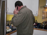 IMGP7822  Dave taking calls while cooking. This might have been a social call to family, actually.