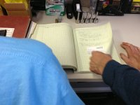 2013-04-03 (29)  Paulo shows how he takes careful notes in his journal.