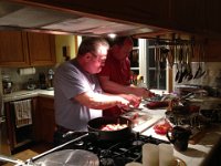 2013-04-05 (69)  Daddy and Richard cooking up last breakfast! I hope we never repeat the crazy airport morning, though. That was so relaxing, until we found out we'd missed our plane! Thankfully it was delayed. MY GOODNESS!