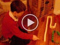 IMGP8242  Undoubtedly this is a domino toppling "vid." Sam wants to start his own YouTube channel.