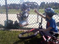 Pic-06282013-006  Ben handing snacks through the fence to Sam :)
