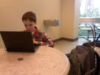 Pic-03132013-002  Sam is old enough to work on his laptop at the aquatic center while Ben is in for swimming lessons. Gives Sam some down time before homework.