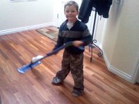 Pic-03192013-002  Ben helping clean our very dirty floor! Lots of foot traffic :)