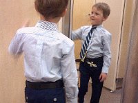 Pic-05172013-004  Trying on First Communion clothes.