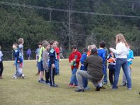 Sam's 9th flag football party 032  Putting flags on many of the boys. : Sam's 9th flag football party