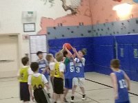WP 20140215 002  Sam did a great job rebounding at this game - something he is good at doing because he's so big. His coach's only suggestion - don't be such a nice guy. Get in there. So he did.