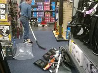 WP 20140218 002  When I went to gather up all the gear, I realized I couldn't get out of the store, so I went to get a gear bag. Meanwhile Sam and Ben were learning to skate around on the carpet (the recommended way to get your bearings). The store wasn't crowded, thankfully, but can you imagine hearing a thud every now and then and wondering what might have gone down?