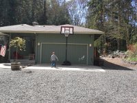 20140404 131039  Ben loves to kick the soccer ball up against the garage over and over again. I hope that door lasts!