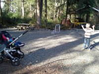 20140407 165305  Neighbor Ingunn was able to mow her lawn while Ben kept Esther happy!