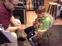 20140410 193129  And now Ben's turn, playing the ukulele that Eddie Kamae gave Sam 4 years ago. It is so beautiful!